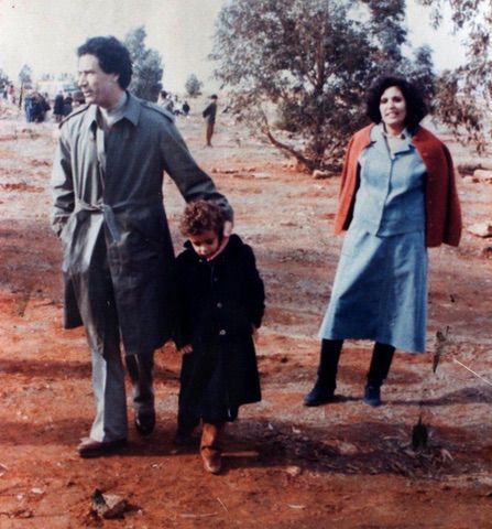 Muammar Gaddafi and wife Safia with young Saif al-Islam, in the 1970s