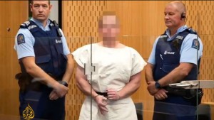 Brenton Tarrant makes strange hand signal in court