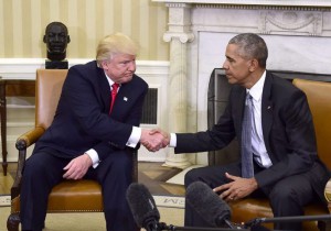 Donald Trump and Barack Obama shake hands