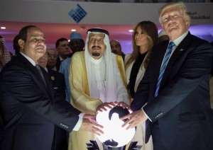 Donald Trump, President Sisi and King Salman posing with a glowing orb