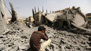 Civilians and rubble in war-torn Yemen