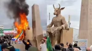 Iranians burning effigies of Baal.